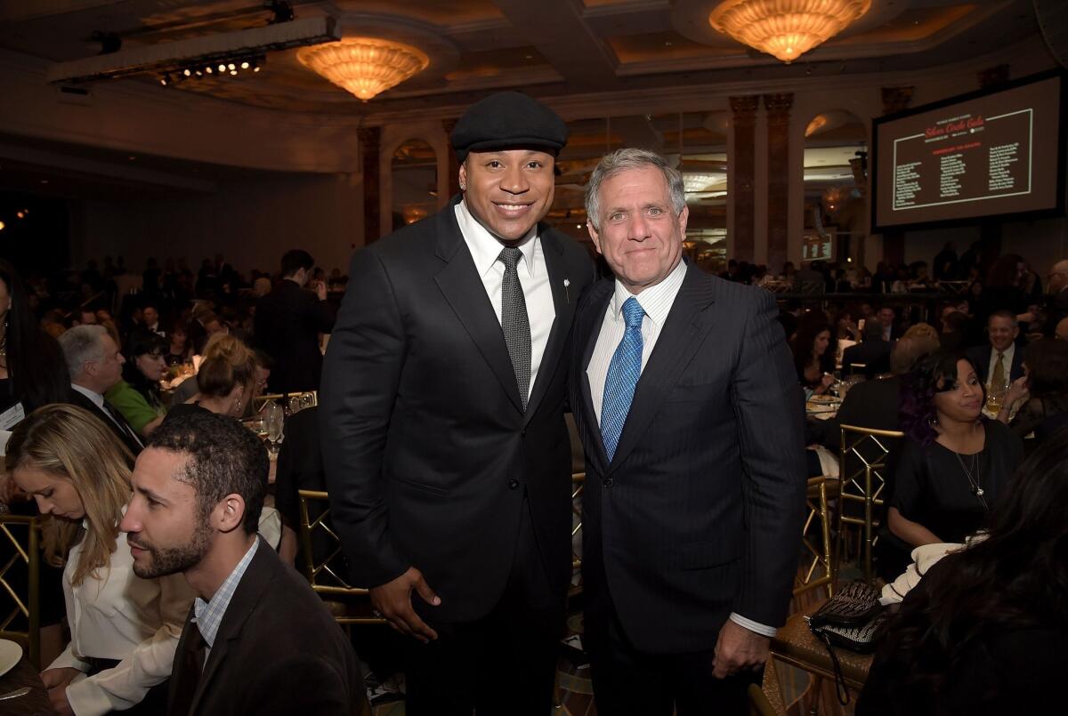 LL Cool J, left, and honoree Leslie Moonves attend the Venice Family Clinic's 33rd Silver Circle Gala in Beverly Hills.