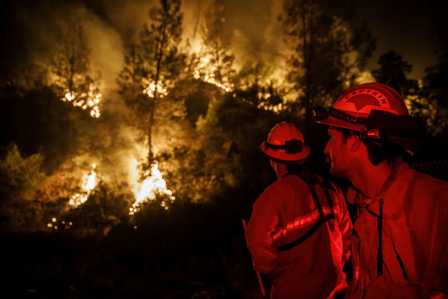 Firefighters keep an eye on a burn operation as part of the battle against the Mendocino Complex blaze on Aug. 7.