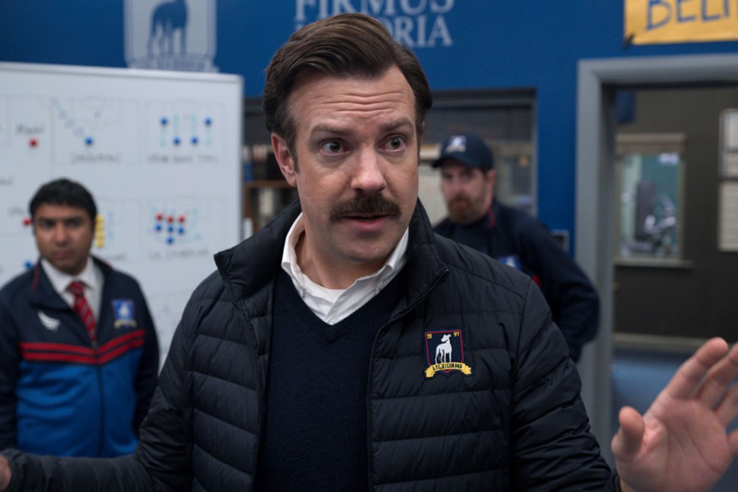 Jason Sudeikis in "Ted Lasso," a feel-good sports comedy we recommend for lowering your election day blood pressure.