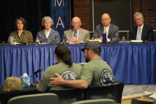 FILE — Members of the independent commission investigating the law enforcement response to the mass shooting in Lewiston, Maine, listen as Nicole Herling, below left, sister of shooter Robert Card, testifies Thursday, May 16, 2024, in Augusta, Maine. (AP Photo/Robert F. Bukaty, File)