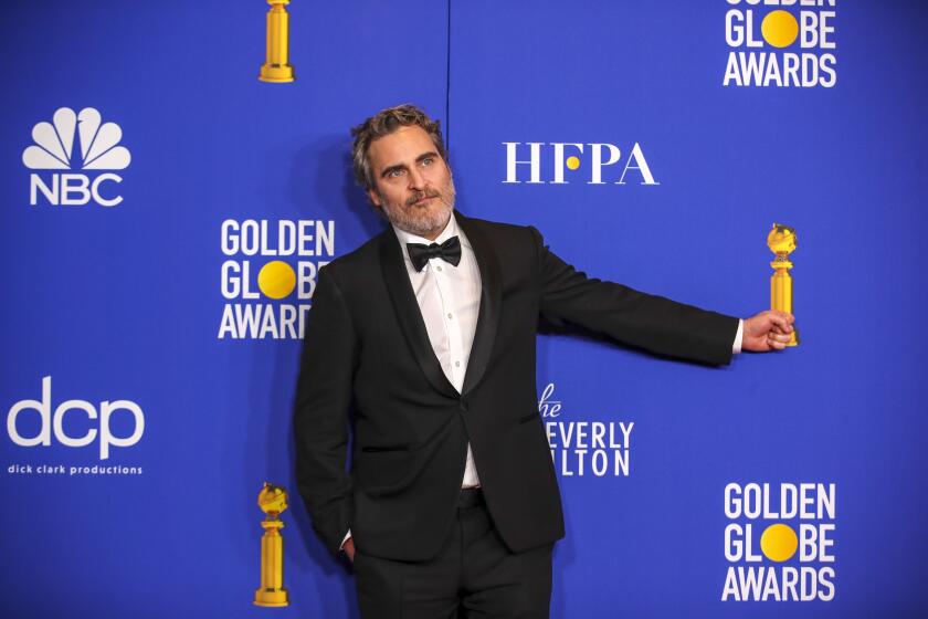 BEVERLY HILLS, CA-JANUARY 05: Joaquin Phoenix in the photo deadline room at the 77th Golden Globe Awards at the Beverly Hilton on January 05, 2020 (Allen J. Schaben / Los Angeles Times)