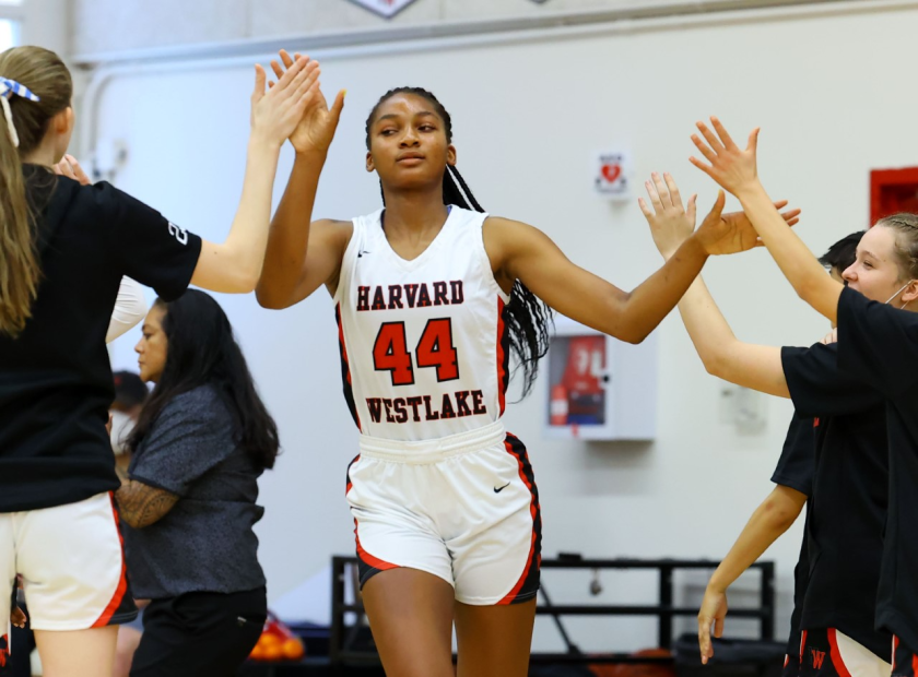 Harvard-Westlake's Kiki Iriafen gets high-fives from teammates