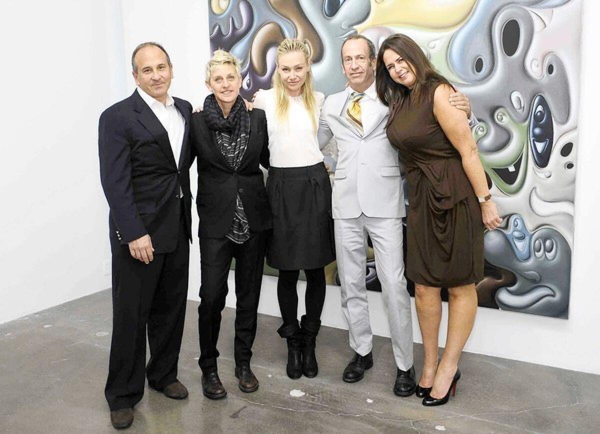 Michael Kohn, left, Ellen DeGeneres, Portia de Rossi, Kenny Scharf and Samantha Glaser attend Michael Kohn's 25th Anniversary Private Art Party and Dinner on Nov. 19.