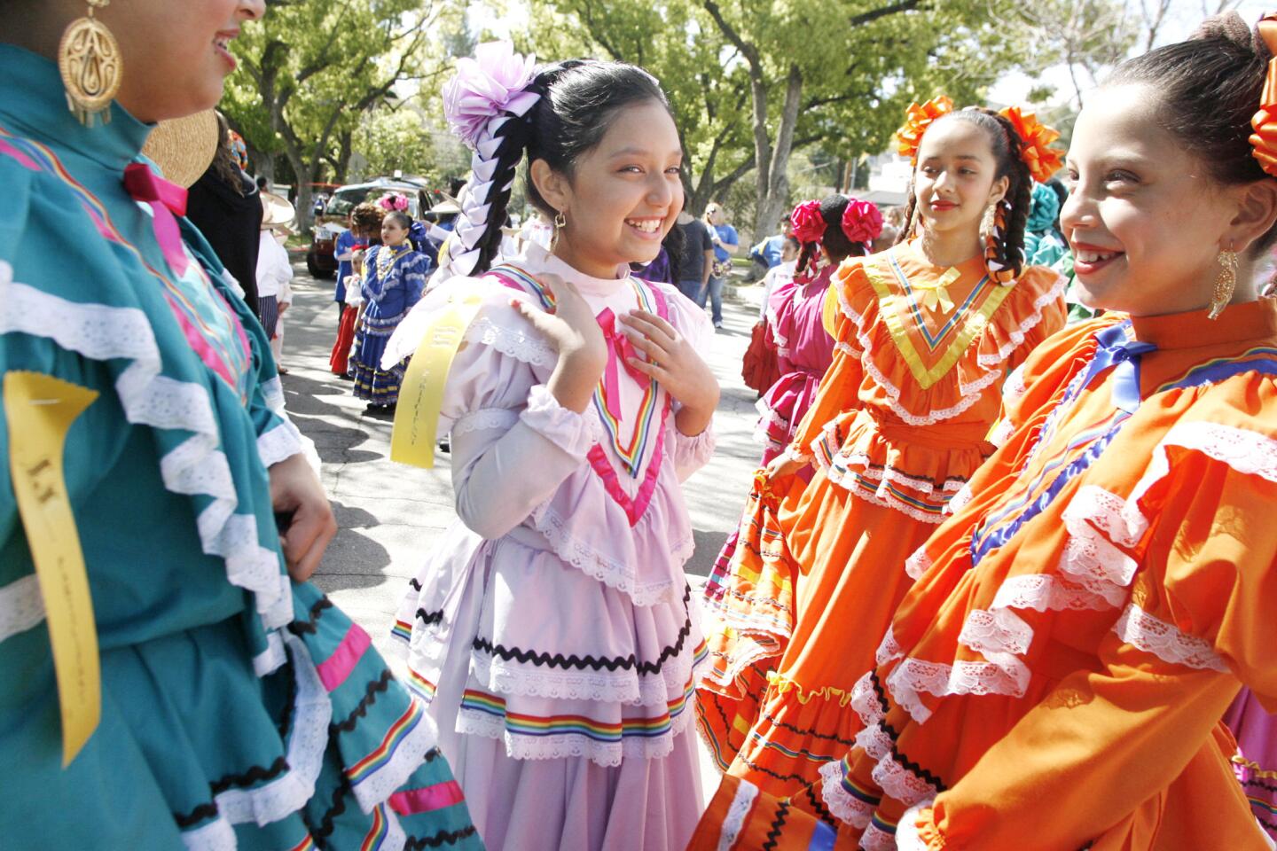 Isabella Gorinez, 10, center, and other members of Ballet Folklorico Mexico Azteca participate in Burbank on Parade, which took place on Olive Ave. between Keystone St. and Lomita St. on Saturday, April 14, 2012.