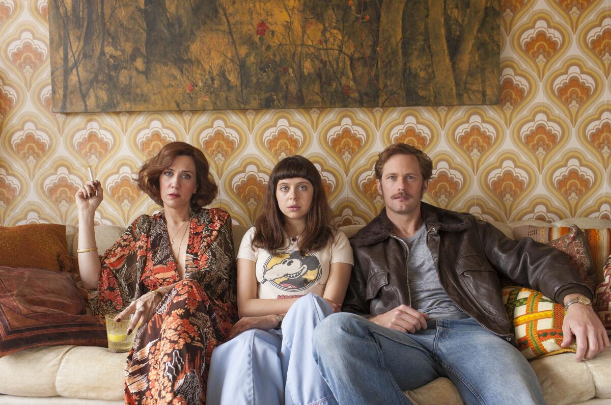 Kristen Wiig, left, is a force in "Diary of a Teenage Girl," with Bel Powley and Alexander Skarsgard.
