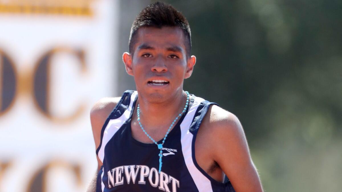 Newport Harbor cross-country runner Alexis Garcia finishes first at the Laguna Hills Cross Country Invitational, Division 2 senior boys' race on Saturday.