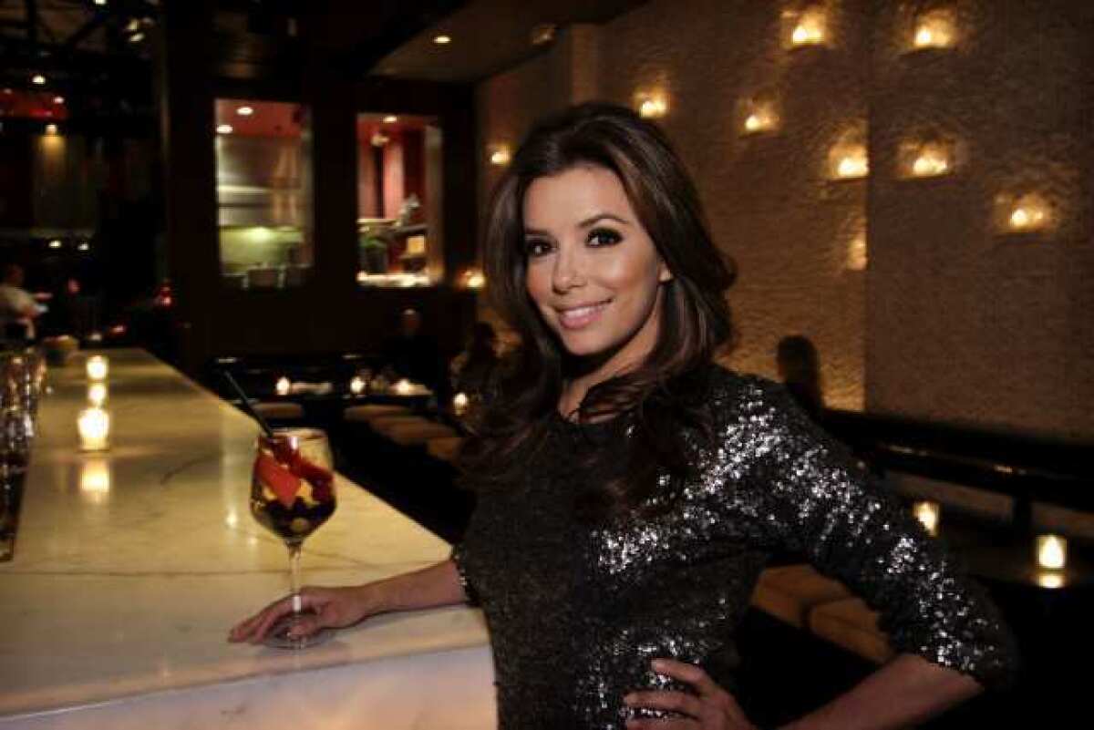 Actress Eva Longoria at the bar of her restaurant Beso in Hollywood in 2011. Longoria will help launch SHe, a steakhouse focused on women, in Las Vegas.