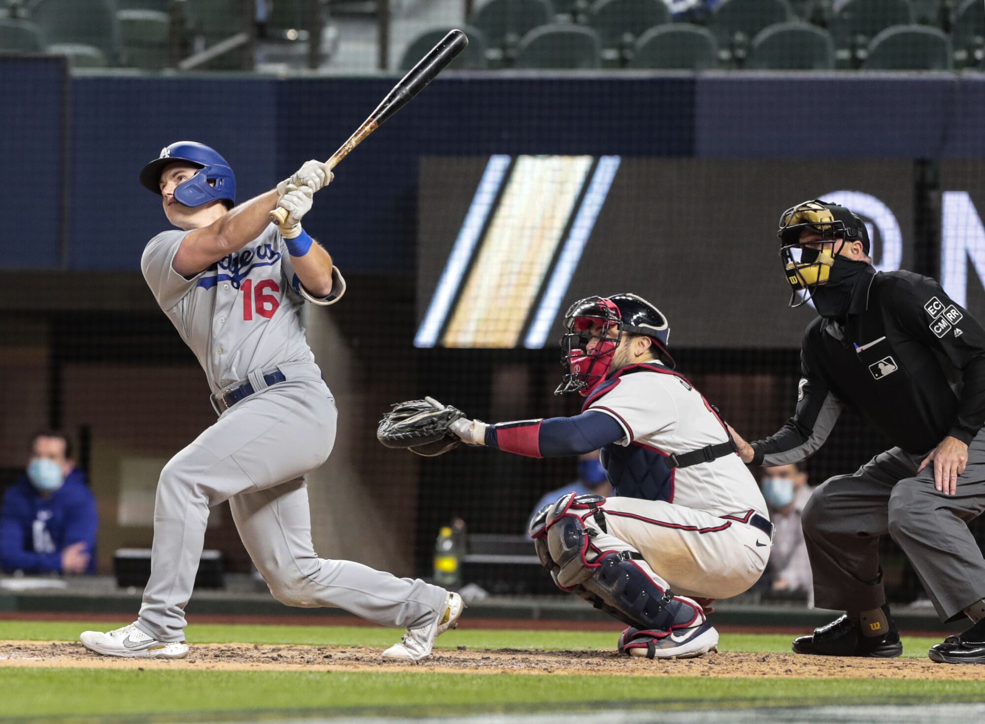 Dodgers catcher Will Smith hits a three-run home run in the sixth inning.