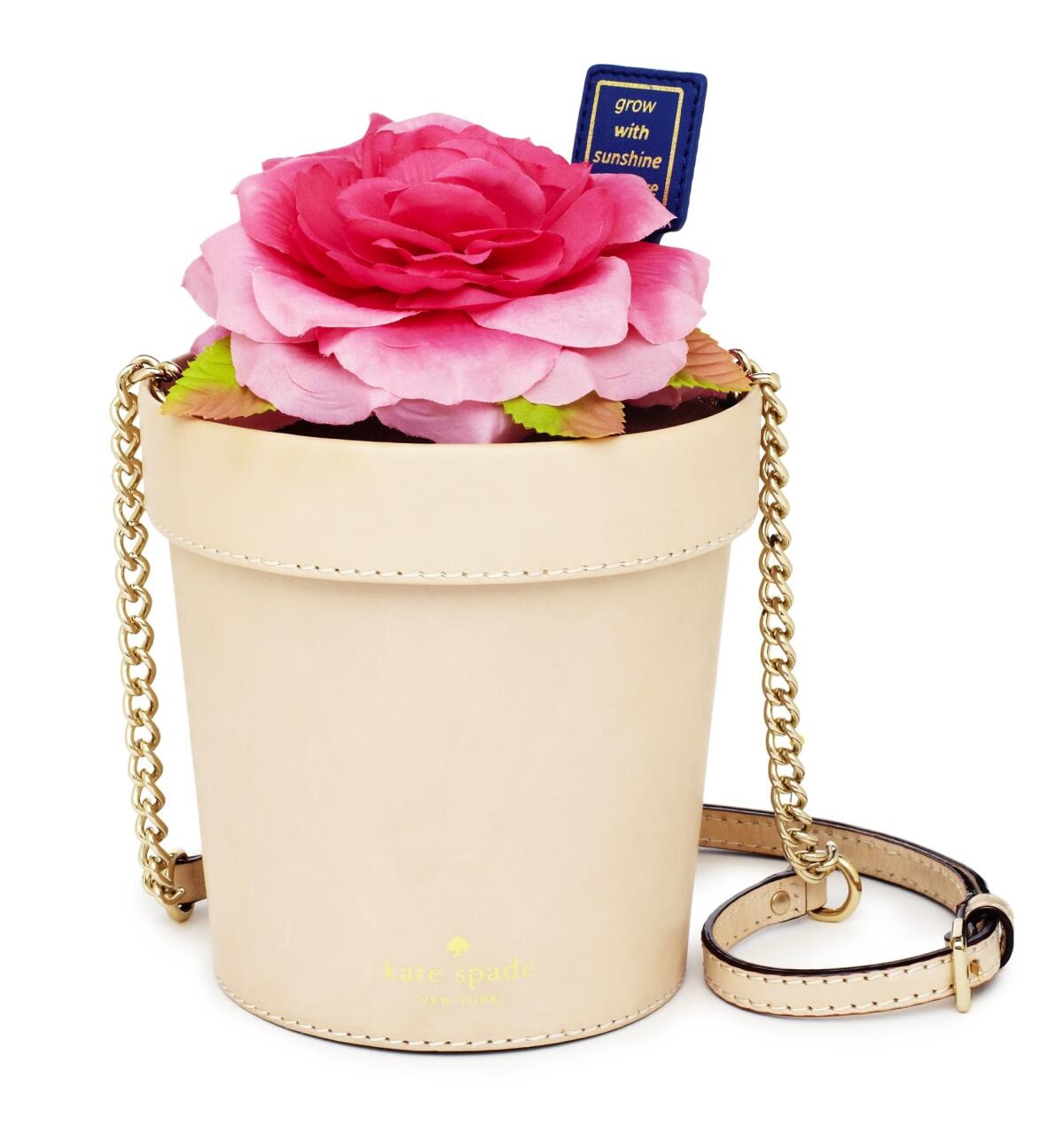 Kate Spade New York's vachetta leather Spring Forward flowerpot cross-body bag, $328.