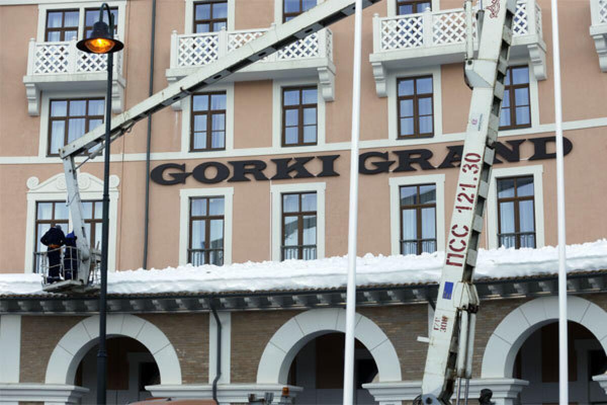 A crane stands outside the Gorki Grand, a hotel in Sochi that didn't open on schedule.