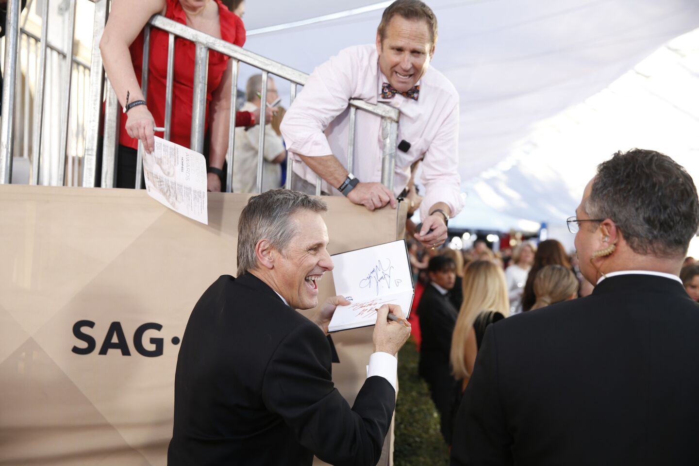 Viggo Mortensen signs autograph during the arrivals at the 23rd Screen Actors Guild Awards.