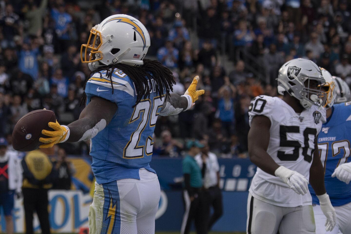 Chargers running back Melvin Gordon celebrates after scoring a touchdown against the Oakland Raiders.