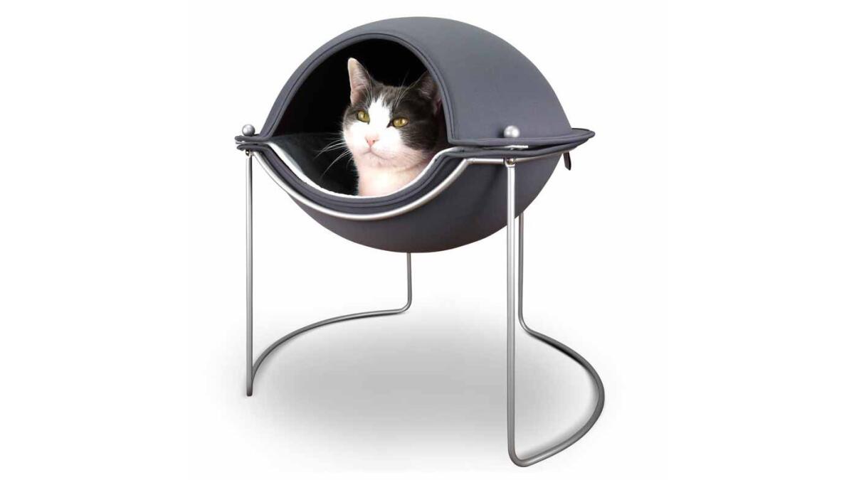 For the high and mighty feline, the Hepper Pod Cat Bed, $117, is an elevated modernist design, available in a range of frame and fabric choices.