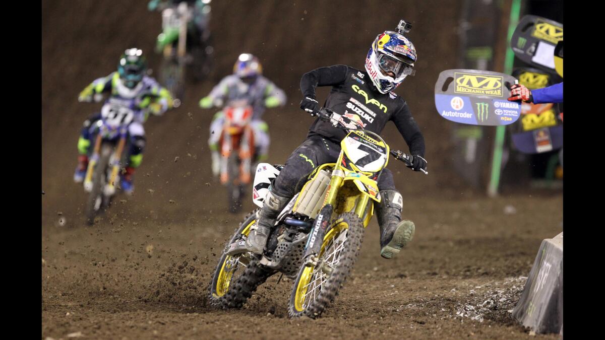 Former 450cc class Monster Energy Supercross champion and AMA 450 Motocross Champion James Stewart, Jr. powers into a turn on his way to a third place finish in a qualifying round on Jan. 9.