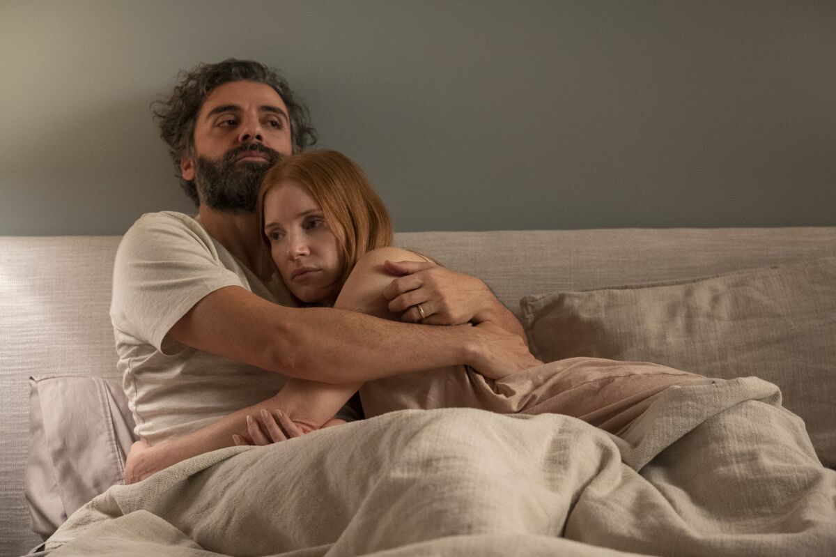Jessica Chastain and Oscar Isaac embrace in the HBO limited series "Scenes From a Marriage"