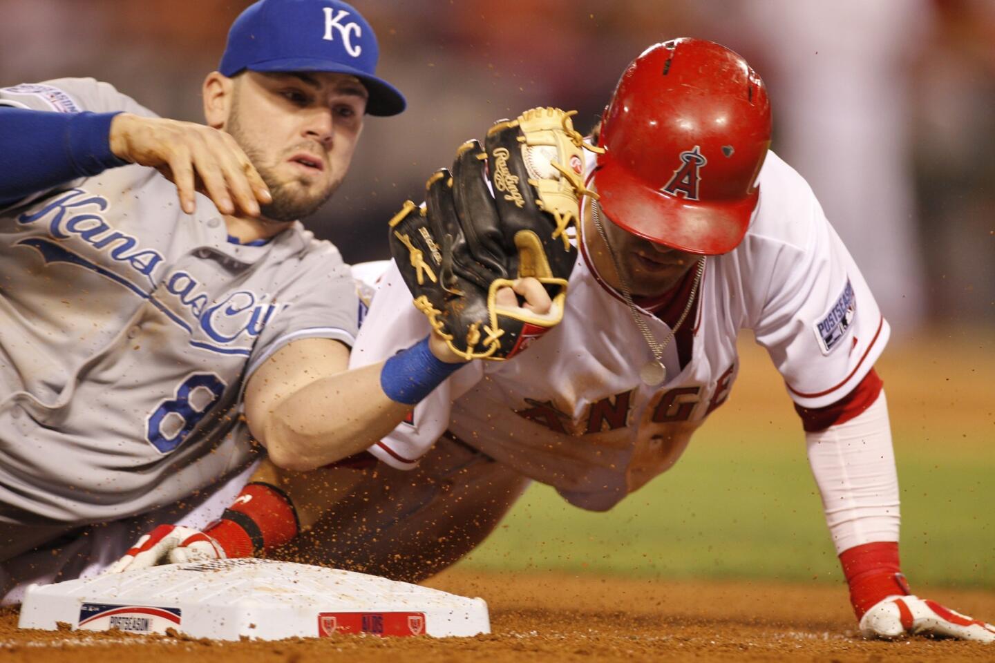 Collin Cowgill, Mike Moustakas