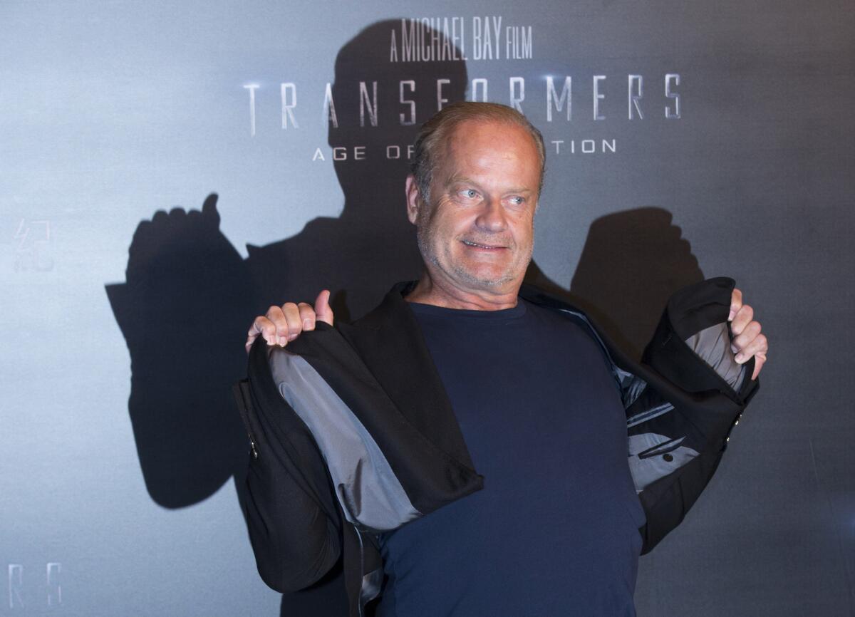 Kelsey Grammer, who struck a pose in June at a news conference before the "Transformers: Age of Extinction" world premiere in Hong Kong, has a mission on Twitter.