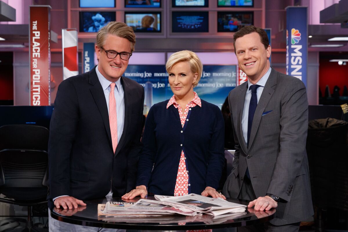 On MSNBC's "Morning Joe" set, from left, co-hosts Joe Scarborough, Mika Brzezinski and Wlllie Geist.