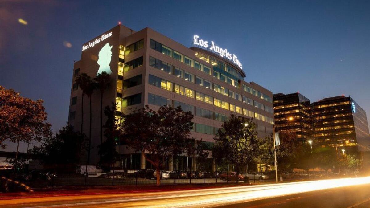 A silhouette of Los Angeles Times food critic Jonathan Gold was projected onto the side of the paper's headquarters in El Segundo on July 28 after his death.