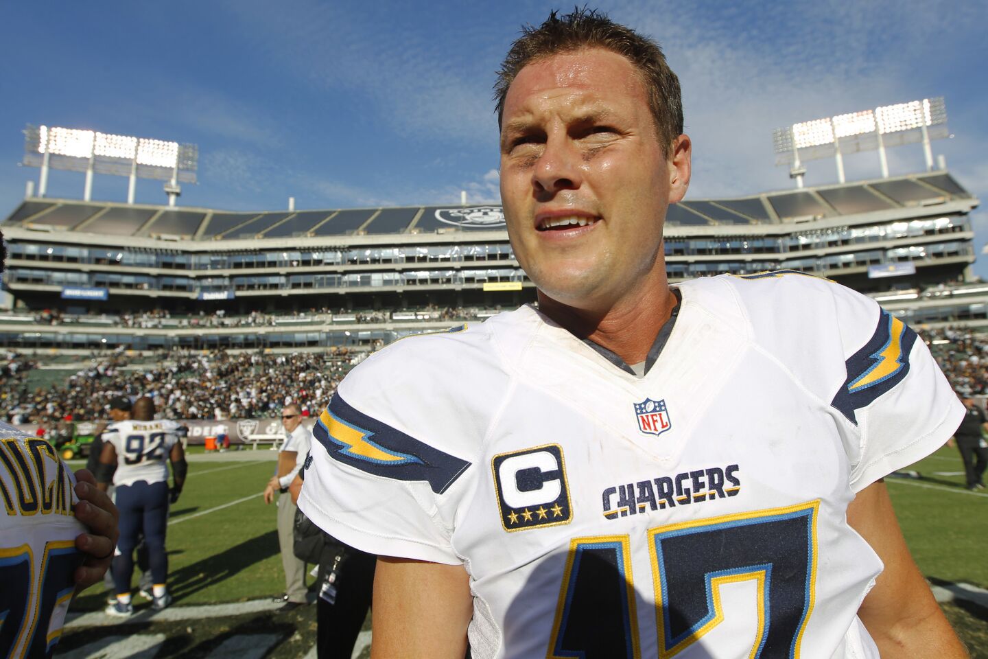 San Diego Chargers Philip Rivers walks of the field after a 34-31 loss to the Raiders in Oakland on Oct. 9, 2016. (Photo by K.C. Alfred/The San Diego Union-Tribune)