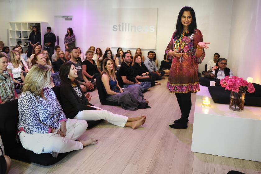 Malika Deepak speaks during a meditation session at Unplug Studio in Los Angeles.