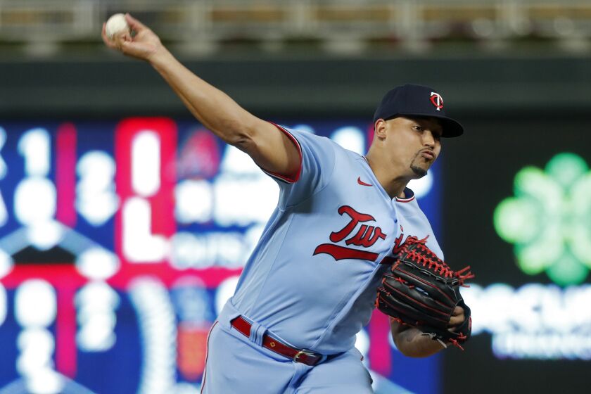 Minnesota Twins relief pitcher Jhoan Duran throws to the Chicago White Sox in the ninth inning of a baseball game Tuesday, Sept. 27, 2022, in Minneapolis. The Twins won 4-0. (AP Photo/Bruce Kluckhohn)