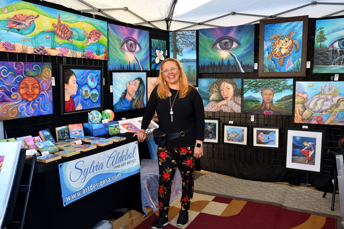 Sylvia Aldebol shows art from her studio during the 2021 La Jolla Art & Wine Festival. This year's event is set for Oct. 8-9.