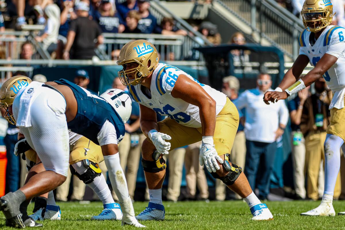 UCLA offensive lineman Niki Prongos lines up to block Penn State defensive lineman on Oct. 5