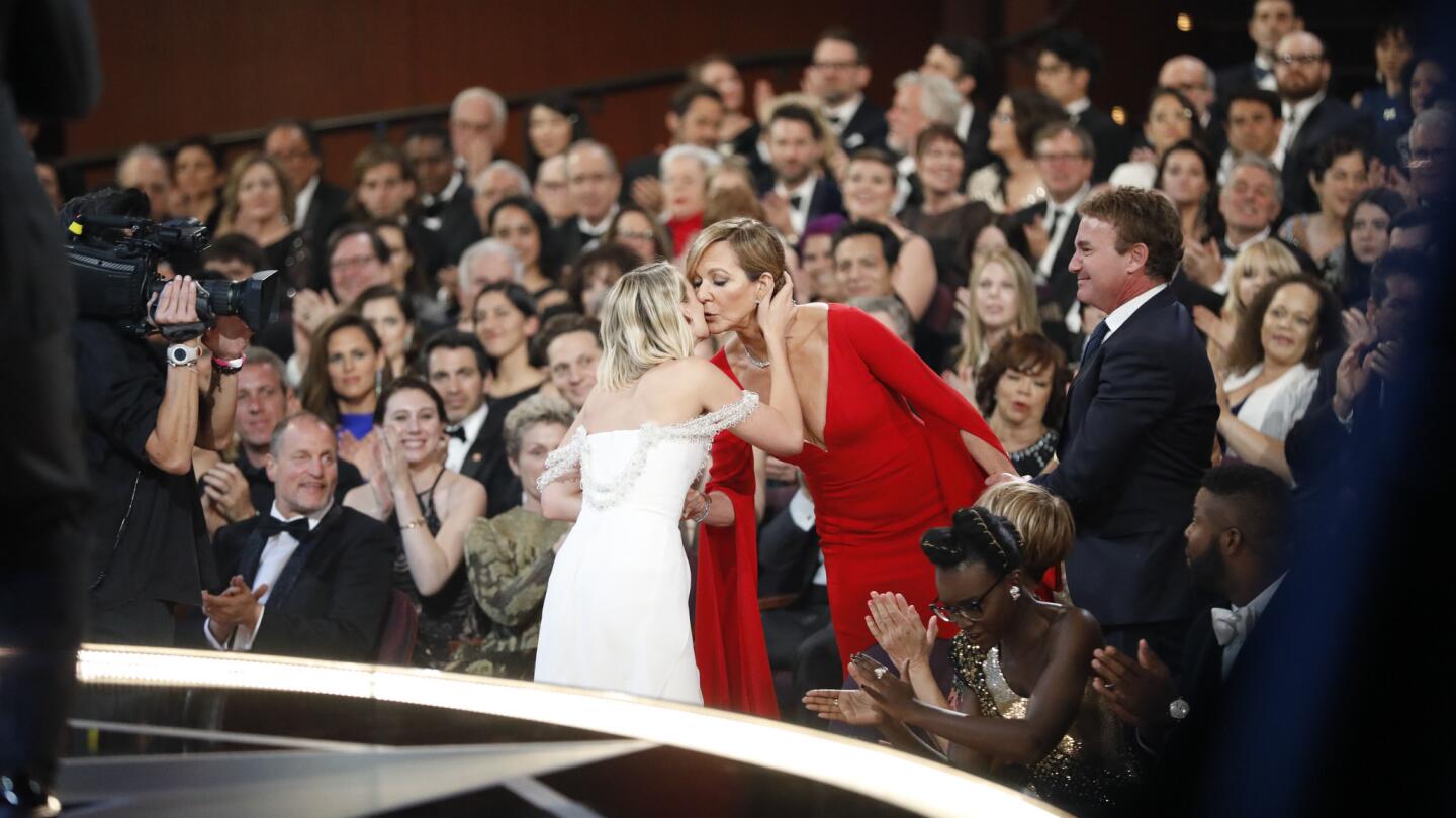 Allison Janney hugs Margot Robbie after Janney won for supporting actress for "I, Tonya," from backstage at the 90th Academy Awards on Sunday at the Dolby Theatre in Hollywood.