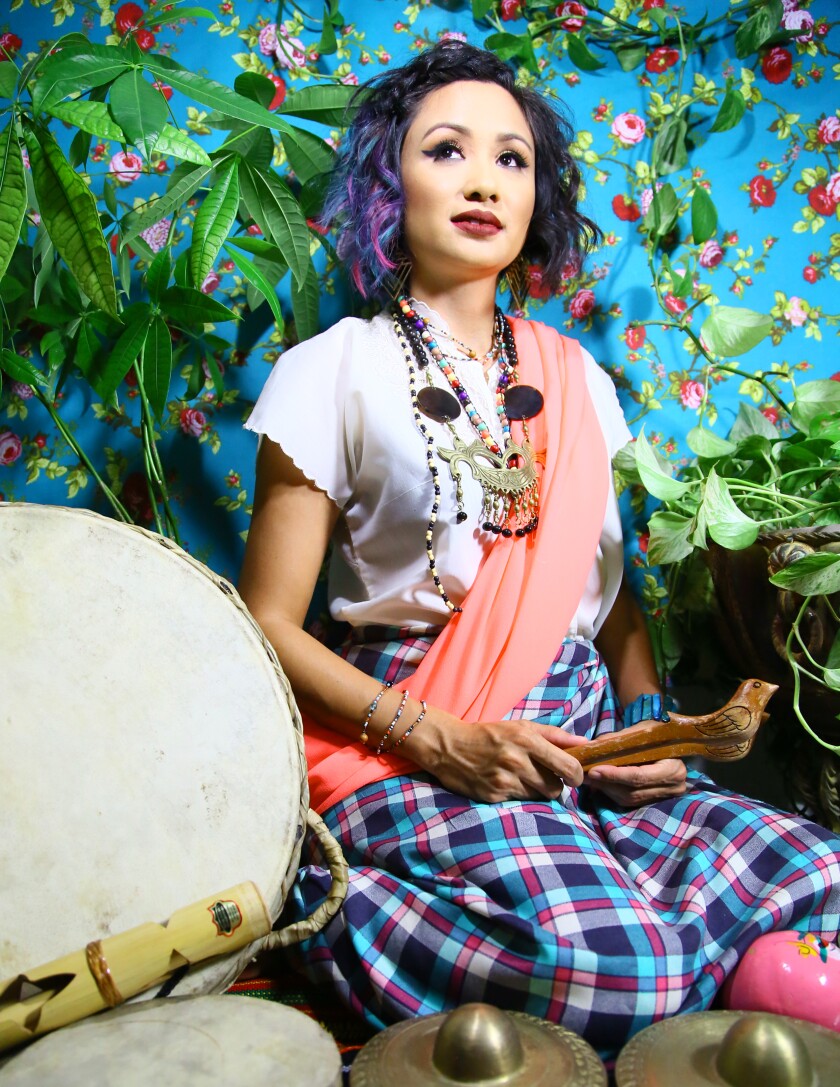 Filipino-American DJ, vocalist and percussionist Gingee uses gongs from the Philippines as part of her mash-up of World Music, hip-hop and electronica.