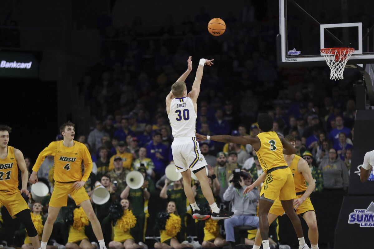 South Dakota State guard Charlie Easley (30) shoots against North Dakota State during the first half of an NCAA college basketball game for the Summit League men's tournament championship Tuesday, March 8, 2022, in Sioux Falls, S.D. (AP Photo/Josh Jurgens)