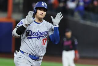 Dodgers star Shohei Ohtani celebrates after hitting a home run against the Mets at Citi Field.