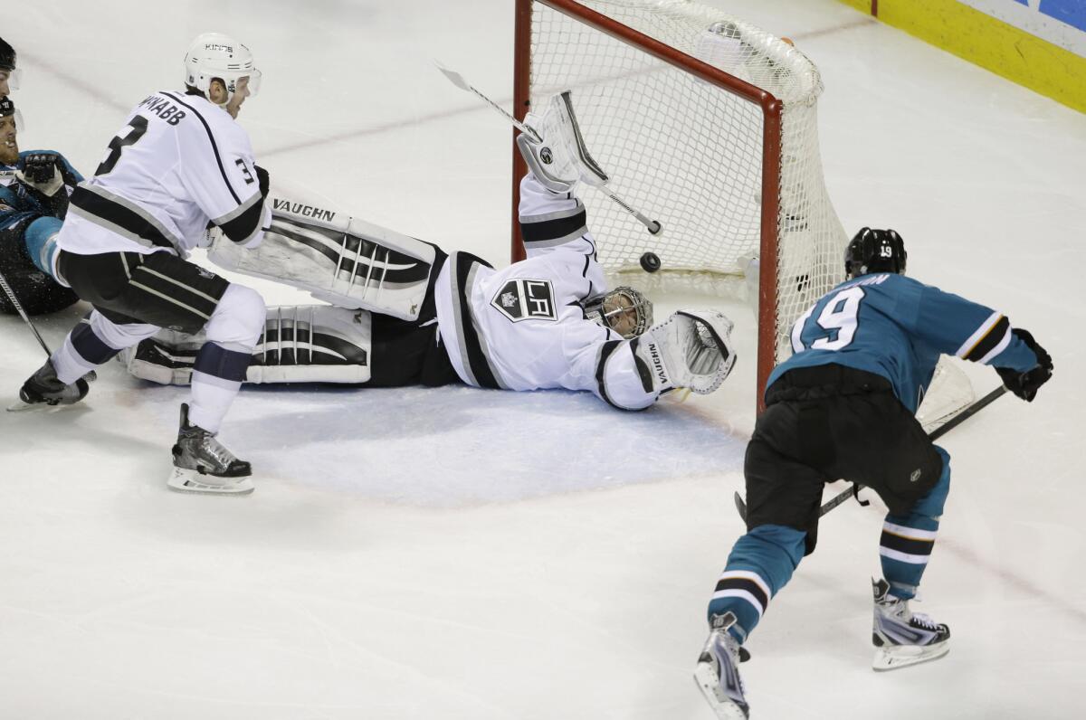 Kings goalie Jonathan Quick is beaten for a goal on a shot from Sharks forward Joe Thornton (19) during the third period of San Jose's 5-2 win.