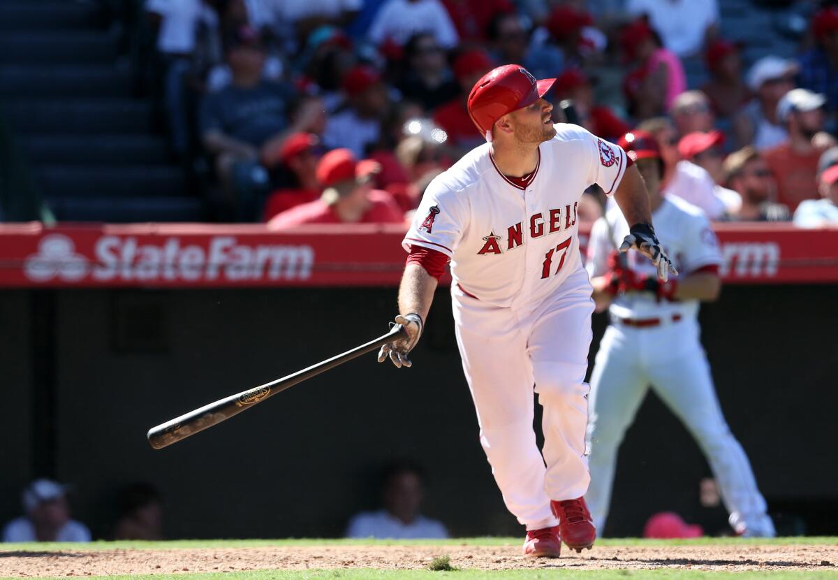Angels' Chris Iannetta watches his solo home run against Oakland on August 31.