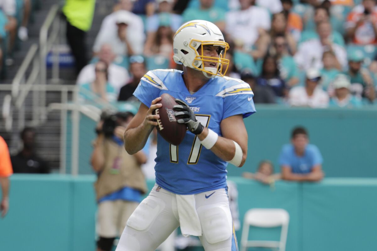 Chargers quarterback Philip Rivers looks to pass against the Dolphins.