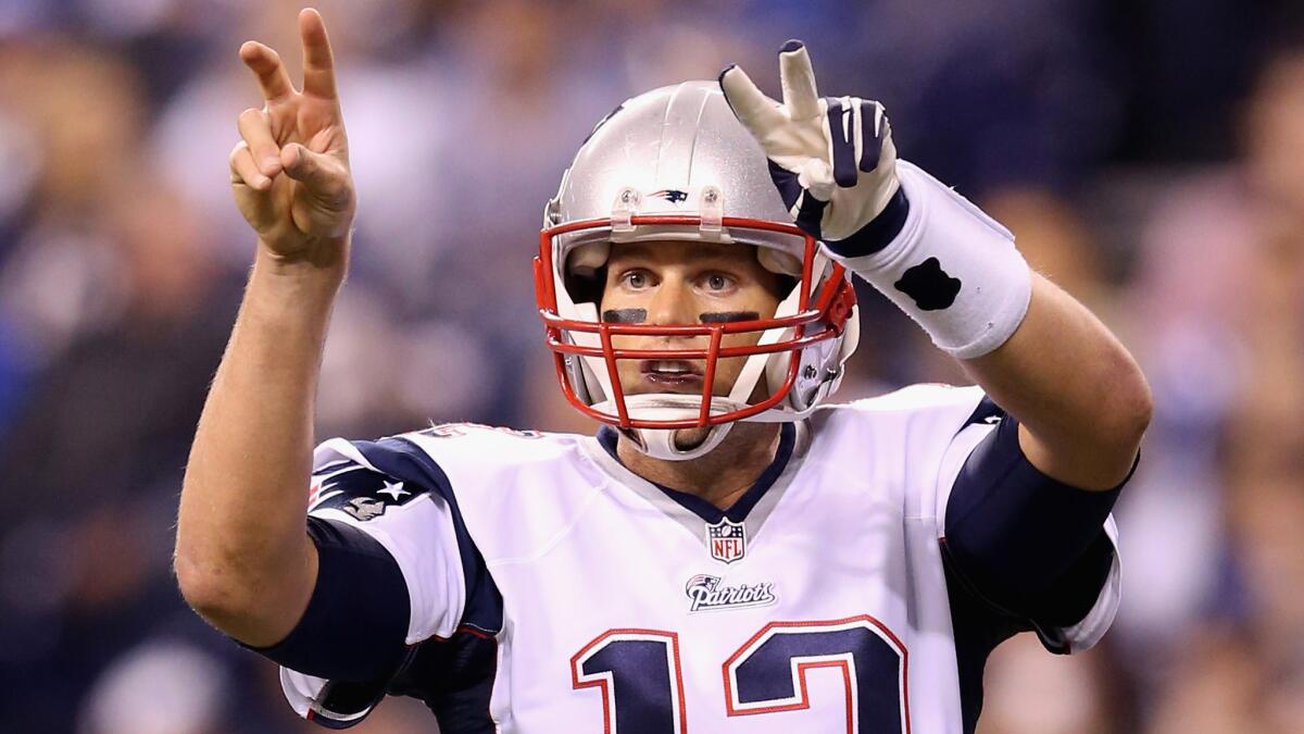 New England Patriots quarterback Tom Brady signals to the sideline during a win over the Indianapolis Colts on Nov. 16.