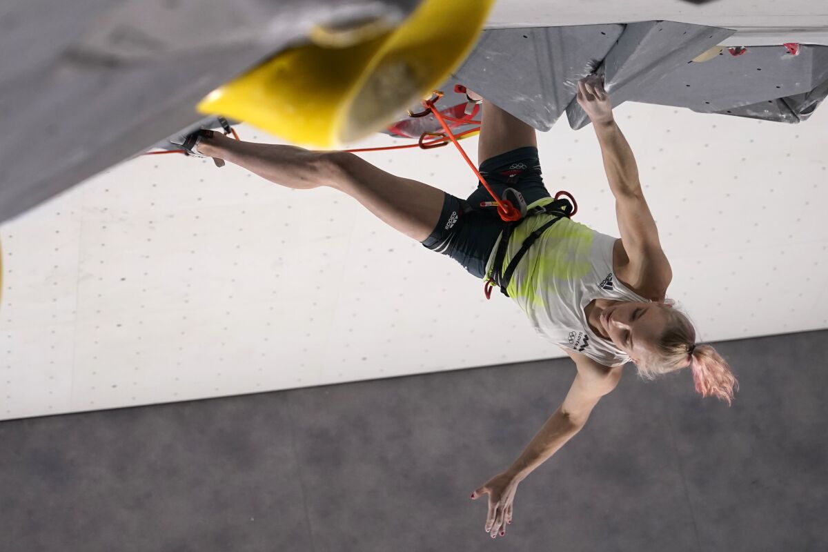 Janja Garnbret, of Slovenia, climbs during the lead qualification portion of the women's sport climbing competition at the 2020 Summer Olympics, Wednesday, Aug. 4, 2021, in Tokyo, Japan. (AP Photo/Jeff Roberson, POOL)