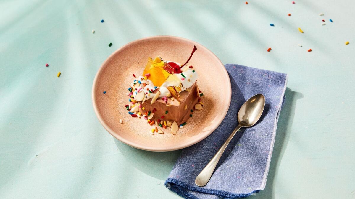 Creamy chocolate semifreddo is delicious with crunchy saffron caramel "glass," nuts and sprinkles.