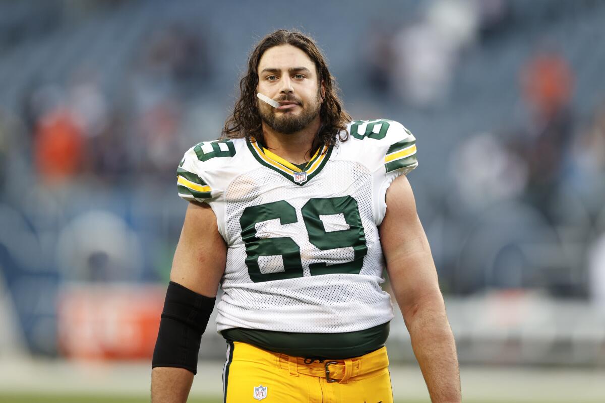 FILE - Green Bay Packers offensive tackle David Bakhtiari walks off the field after an NFL football game, Sept. 10, 2023, in Chicago. Bakhtiari's time with the Green Bay Packers is over after 11 seasons, general manager Brian Gutekunst announced Monday, March 11, 2024, that the team has released him. (AP Photo/Kamil Krzaczynski, File)
