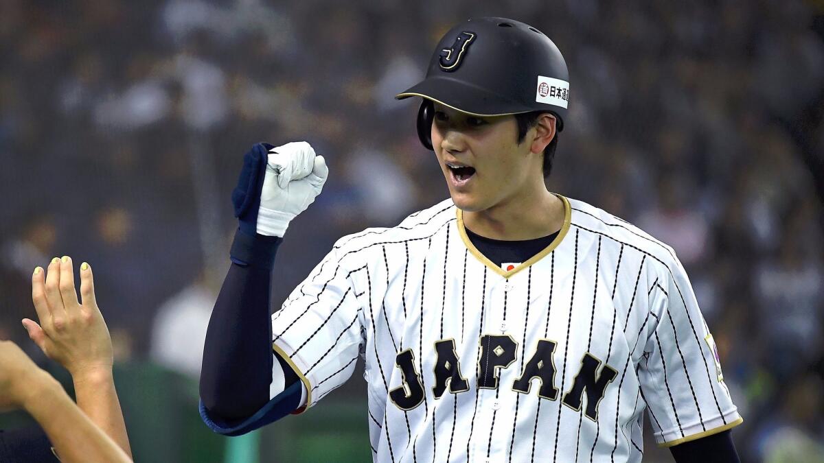 Japan star Ohtani gets green light to hit and pitch in World