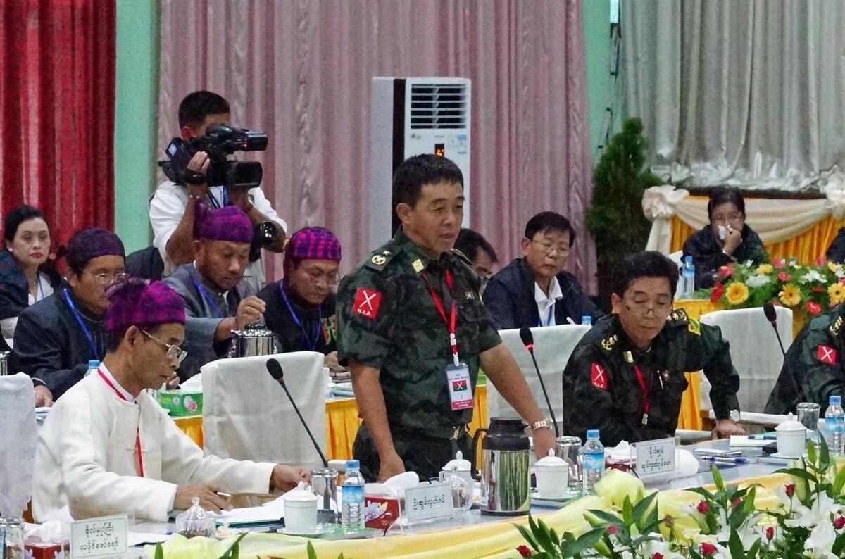 Gen. Gwan Maw, center, of the Kachin Independence Army, speaks at a meeting with representatives of the Myanmar government on Tuesday.