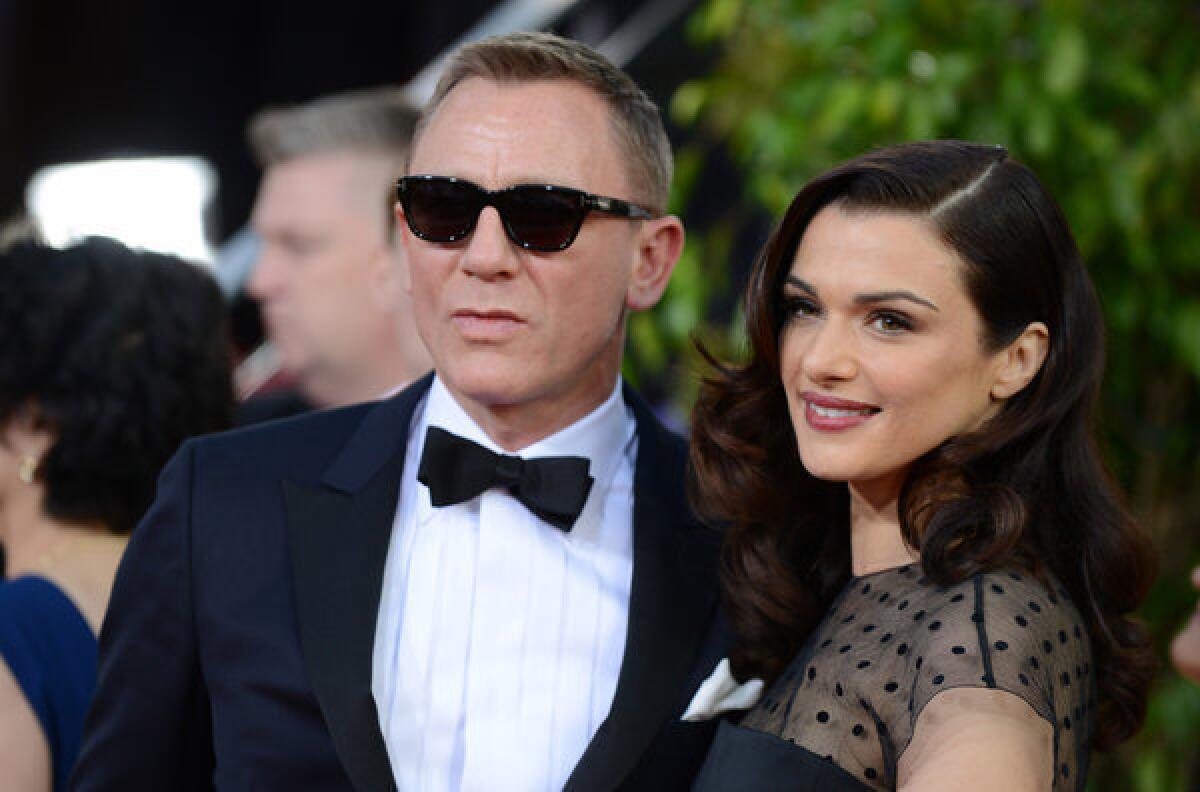 Daniel Craig and his wife Rachel Weisz arrive at the Golden Globes.