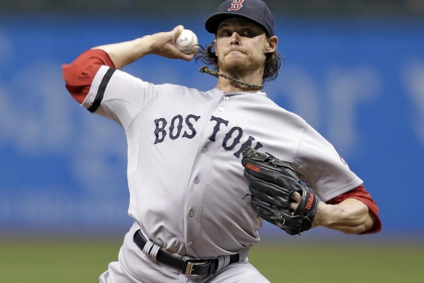 Red Sox starter Clay Buchholz delivers a pitch in Boston's 2-0 victory over the Tampa Bay Rays on Tuesday.