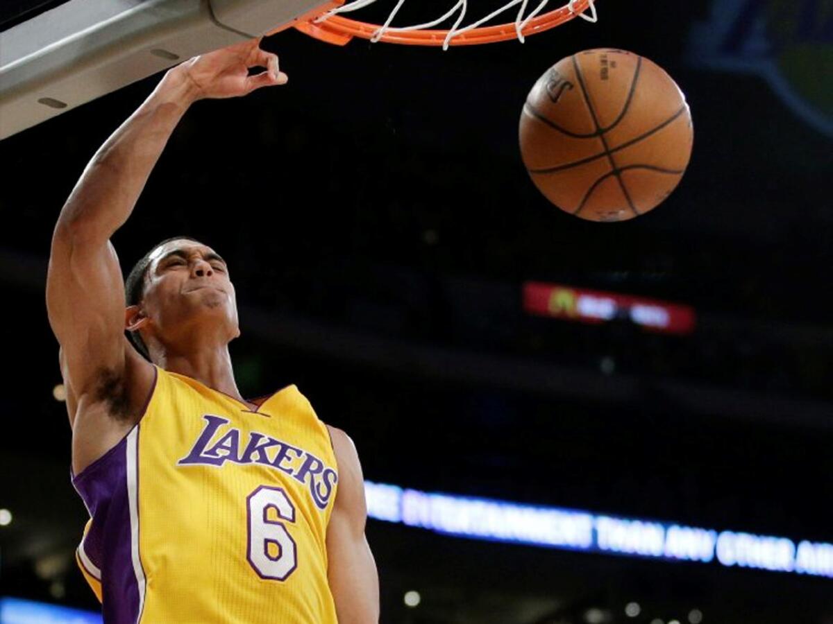 Lakers point guard Jordan Clarkson slams home two of his 13 points in the first half.