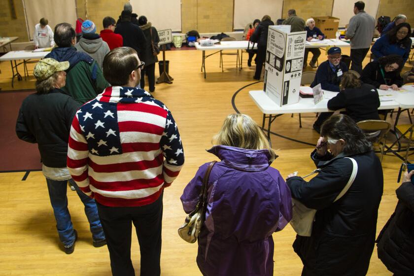 Voters wait to cast their ballots in Wauwatosa.