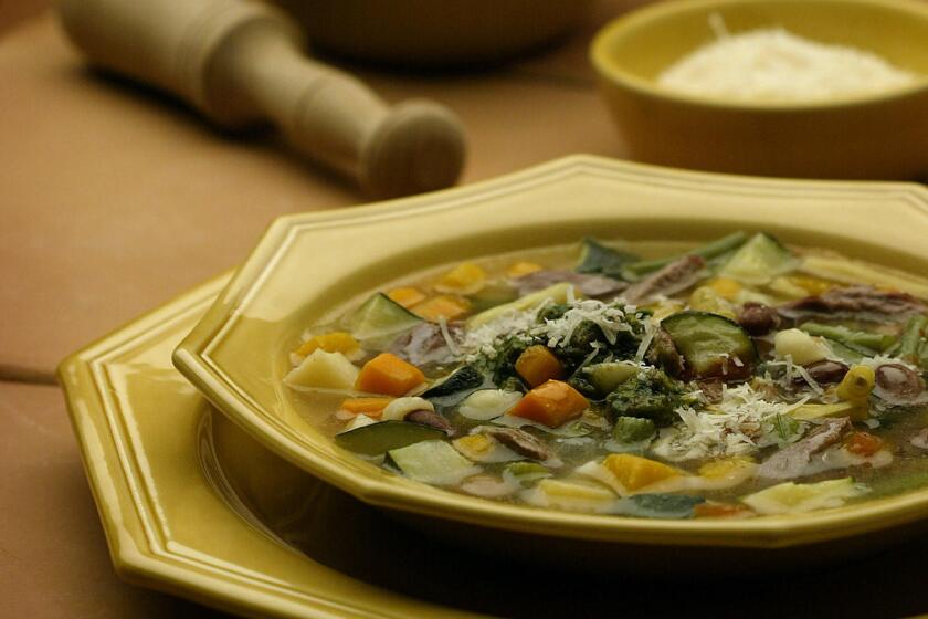 Digital Image taken on Wednesday, 9/8/2004, Los Angeles, CA - Photo by Ricardo DeAratanha/Los Angeles Times -- Vegetable soup with garlic and basil.