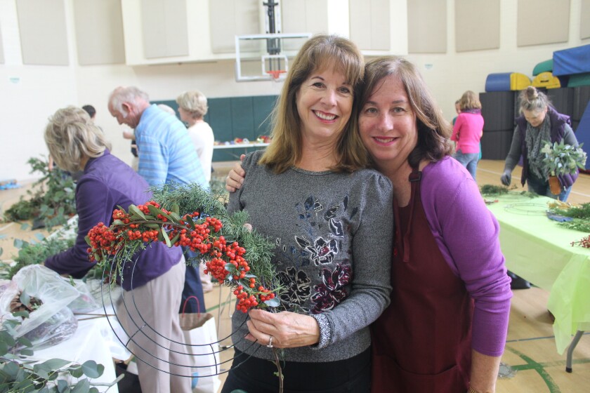 Patrice Reynolds and Georgette O'Brien at a past wreath-making event.