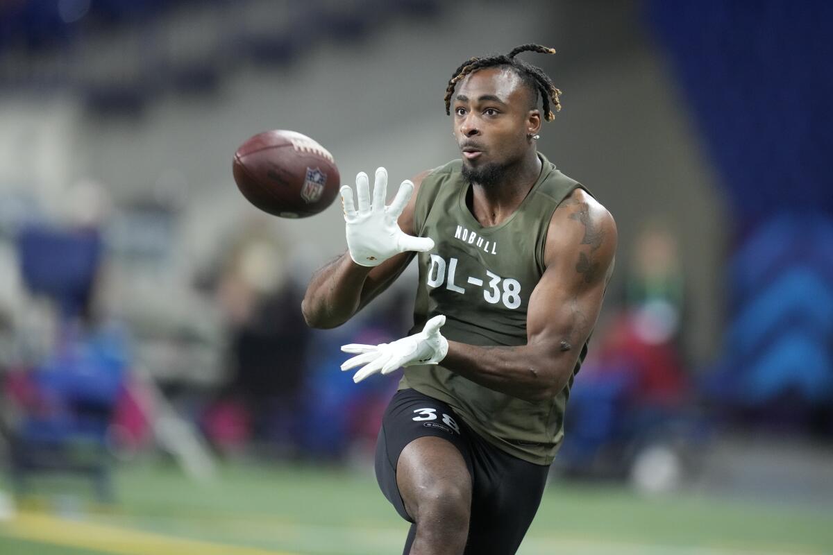 Iowa State defensive lineman Will McDonald runs a drill at the NFL Scouting Combine in March.