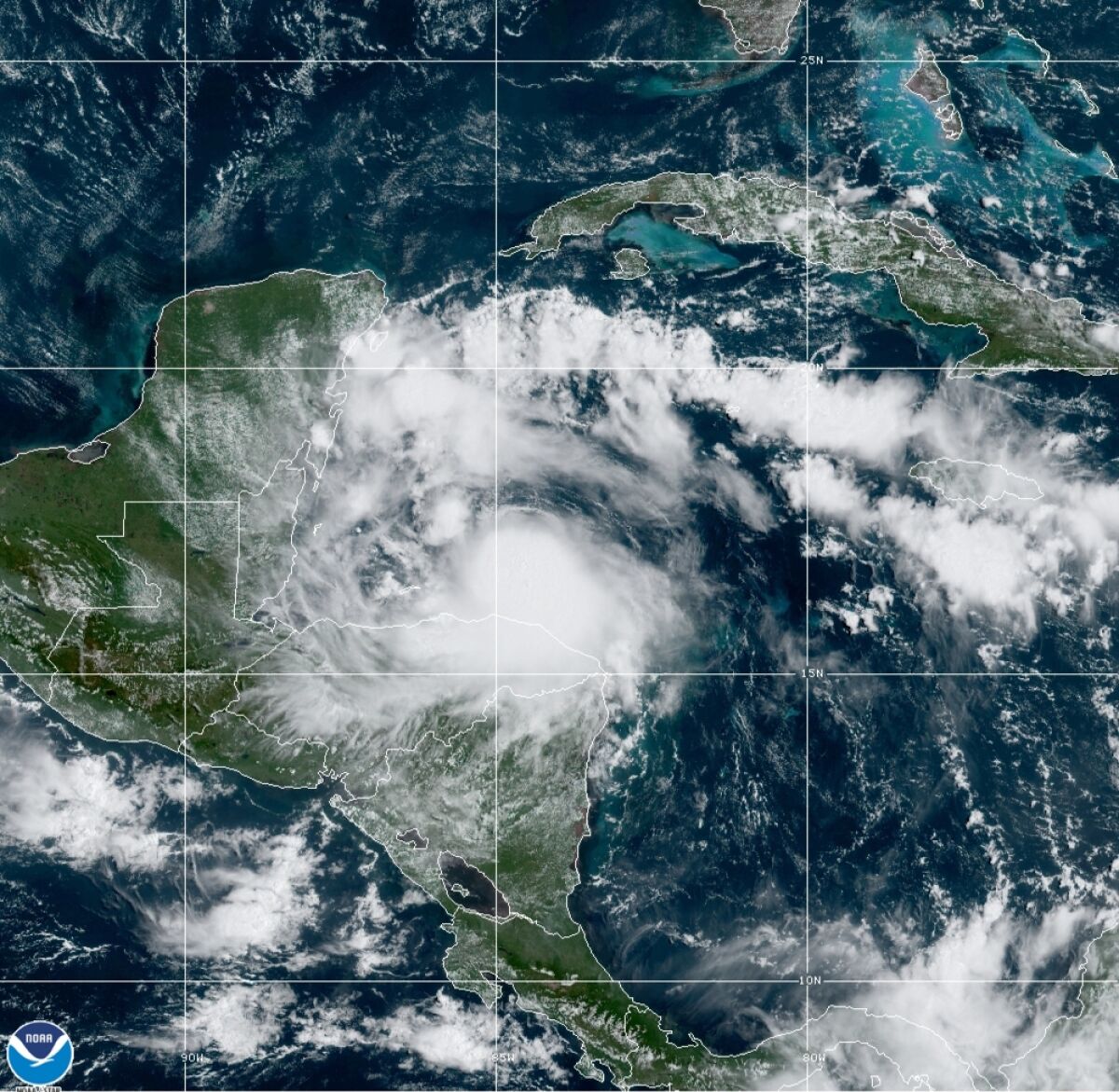 This satellite image released by the National Oceanic and Atmospheric Administration (NOAA) shows Tropical Storm Nana approaching Belize, Wednesday, Sept. 2, 2020. The storm is expected to strengthen throughout the day and make landfall in Belize as a hurricane late Wednesday or early Thursday. (NOAA via AP)
