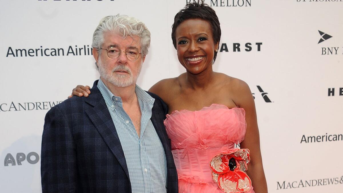 L.A. is vying for George Lucas' art collection. That's the Jedi Master, above, with his wife, businesswoman Mellody Hobson, at the Apollo Theater Spring Gala in New York earlier this week.